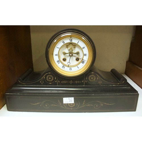 524 - A Victorian slate striking mantel clock, the white enamel dial with Roman numerals denoting hours an... 