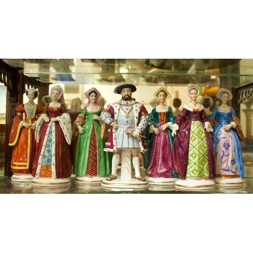 44 - A set of seven Sitzendorf figures of Henry VIII and his six wives, comprising King Henry VIII, Kathe... 