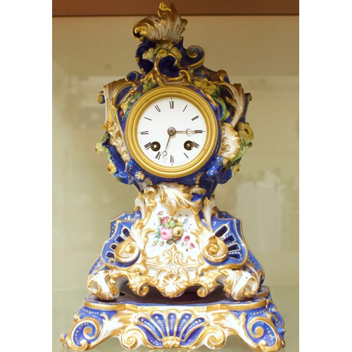 525 - A 19th Century porcelain mantel clock, the eight-day movement striking a bell, marked ‘Delolme á Par... 