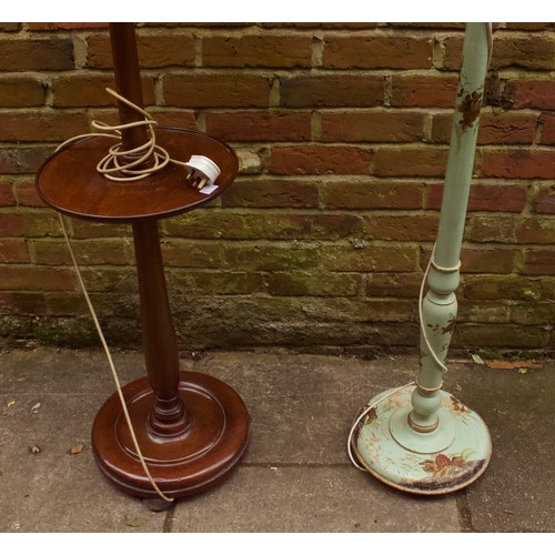 539 - Two 20th Century solid wood floor standing standard lamps, one painted green with flora and fauna de... 