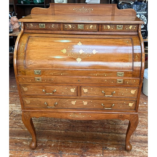 625 - A 20th Century brass inlaid hardwood bureau, cylinder front opens to reveal writing slide and pigeon... 