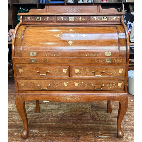 625 - A 20th Century brass inlaid hardwood bureau, cylinder front opens to reveal writing slide and pigeon... 