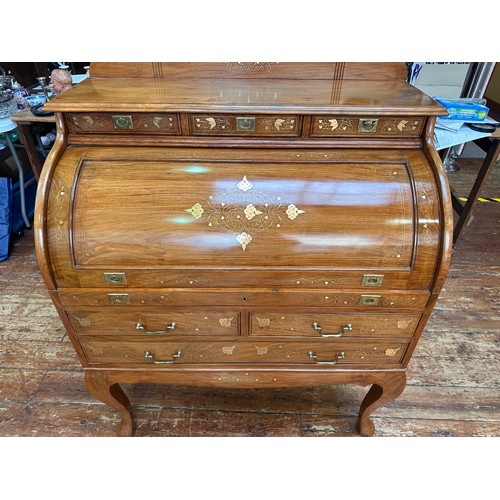 625 - A 20th Century brass inlaid hardwood bureau, cylinder front opens to reveal writing slide and pigeon... 