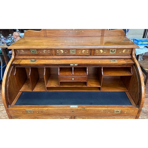 625 - A 20th Century brass inlaid hardwood bureau, cylinder front opens to reveal writing slide and pigeon... 