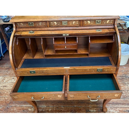 625 - A 20th Century brass inlaid hardwood bureau, cylinder front opens to reveal writing slide and pigeon... 