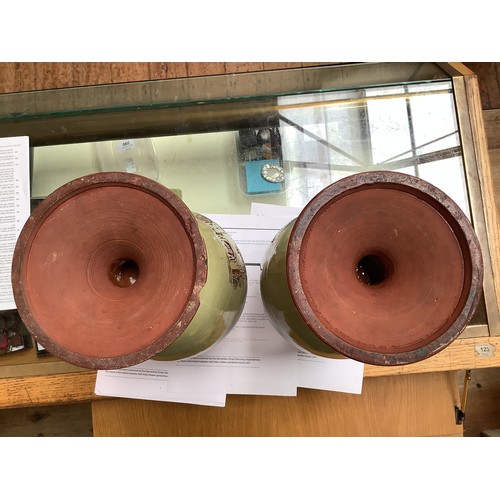 37 - A pair of large glazed stoneware pottery vases, of baluster ovoid form with flared rim and splaying ... 