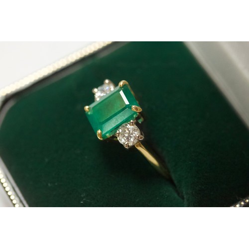 167 - An 18ct gold dress ring, four-claw set with a rectangular-shaped emerald, measuring approximately 10... 