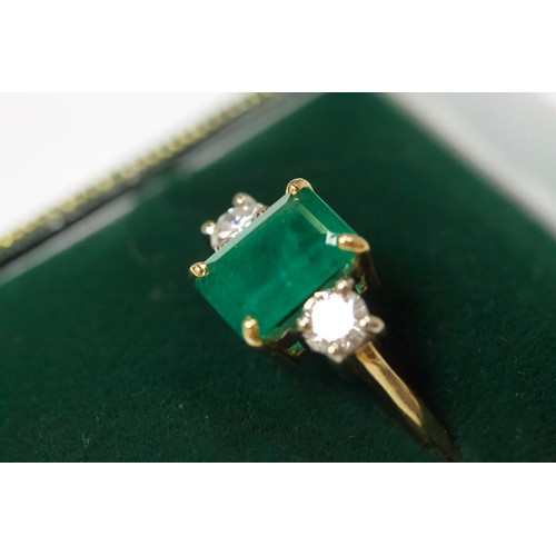 167 - An 18ct gold dress ring, four-claw set with a rectangular-shaped emerald, measuring approximately 10... 