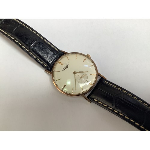 120 - A vintage 9ct gold cased gents Longines wristwatch, C.1950’s, the silvered dial with gilt batons den... 