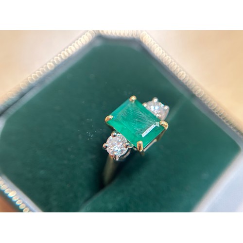 167 - An 18ct gold dress ring, four-claw set with a rectangular-shaped emerald, measuring approximately 10... 