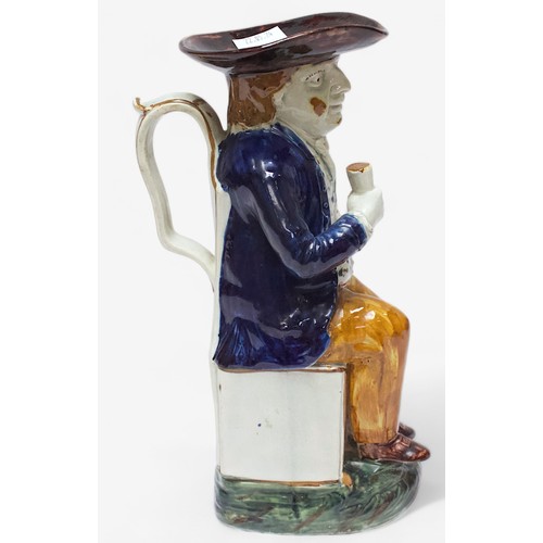 35 - A Prattware Pottery ‘Sailor’ toby jug, c1790-1810, with blue coat and floral painted waistcoat and m... 