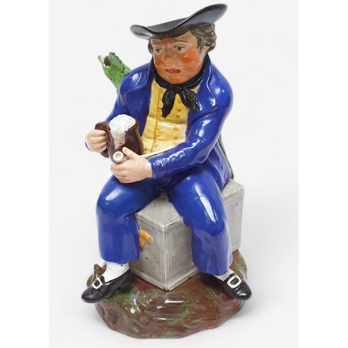 37 - A 19th Century unmarked and heavily potted Staffordshire Pearlware toby jug of an ‘American Sailor,’... 