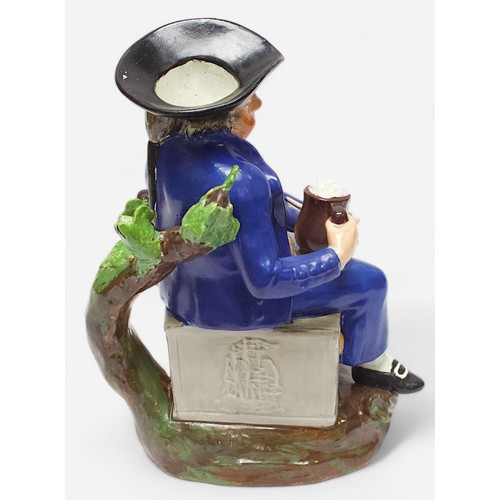 37 - A 19th Century unmarked and heavily potted Staffordshire Pearlware toby jug of an ‘American Sailor,’... 