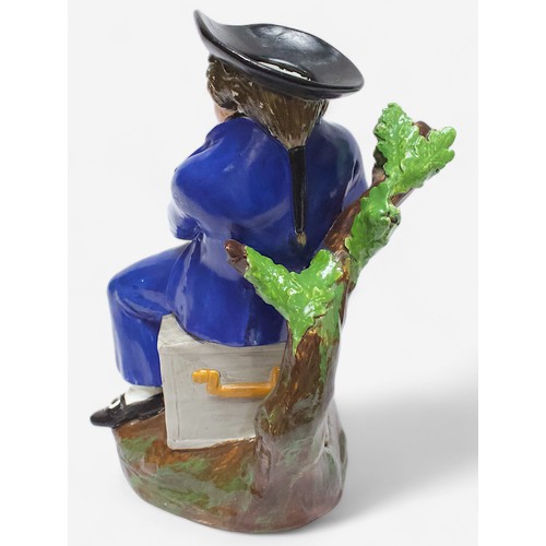 37 - A 19th Century unmarked and heavily potted Staffordshire Pearlware toby jug of an ‘American Sailor,’... 