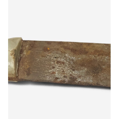 434 - An early 20th Century Parang sword and scabbard, two-piece horn handle, blade inscribed ‘No. 127 H’,... 