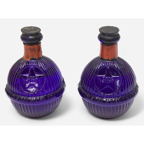 56 - Two Harden Company blue glass Star Hand Grenade Fire Extinguishers, No. 10490, with liquid contents ... 