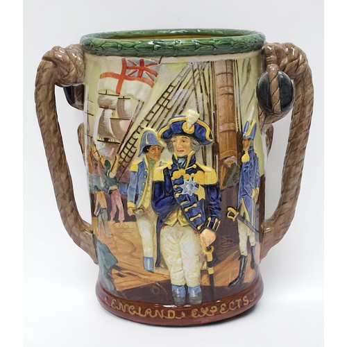 46 - (WITH CERTIFICATE) A Royal Doulton loving cup, 'Nelson’, designed by Charles Noke and Harry Fenton, ... 