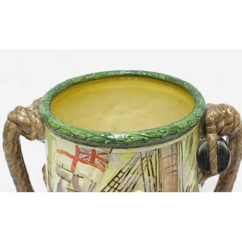 46 - (WITH CERTIFICATE) A Royal Doulton loving cup, 'Nelson’, designed by Charles Noke and Harry Fenton, ... 