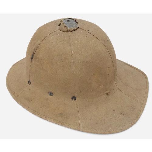 52 - A British WWII Air Raid Wardens Brodie helmet, with leather liner and khaki webbing chin strap, toge... 