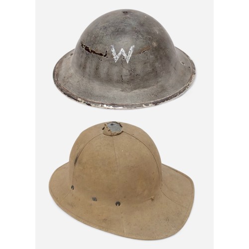 52 - A British WWII Air Raid Wardens Brodie helmet, with leather liner and khaki webbing chin strap, toge... 