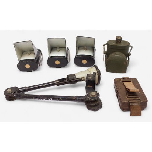 75 - A collection of assorted WWII lamps, comprising three Air Raid Precautions (A.R.P.) lamps with hood ... 