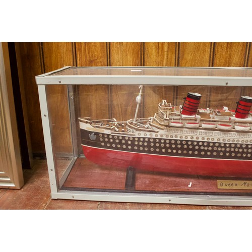 99 - A large scratch built model of the White Star Line RMS Queen Mary, with wood effect deck, lifeboats ... 