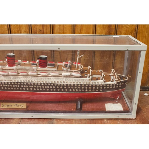 99 - A large scratch built model of the White Star Line RMS Queen Mary, with wood effect deck, lifeboats ... 