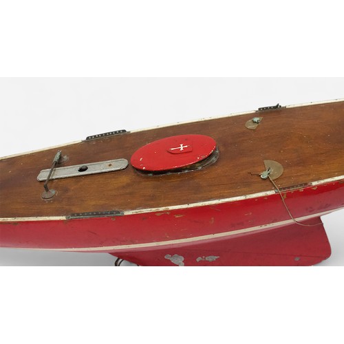 101 - A vintage red painted Marblehead class pond yacht, with white painted stripe to hull, some parts of ... 