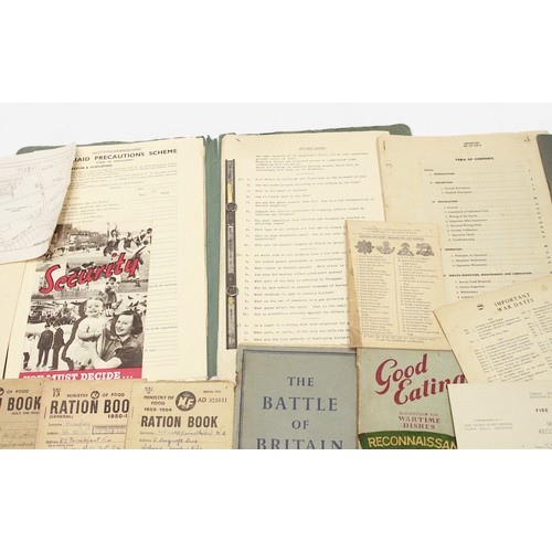 134 - A collection of WWII documentation and ephemera, comprising Regular Army Certificate of Service book... 