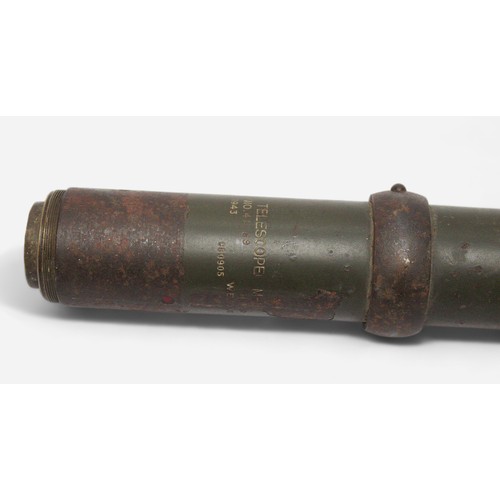 111 - A WWII green painted tank scope/sight from a Sherman Tank, dated 1943, no.41169, makers stamp W. E. ... 