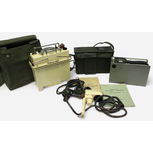 175 - Three various British military issue radiological instruments, comprising a Meter Dose-Rate Portable... 