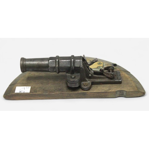 185 - A Victorian gamekeepers poachers Alarm, miniature iron cannon, presented as a memento of service, wi... 