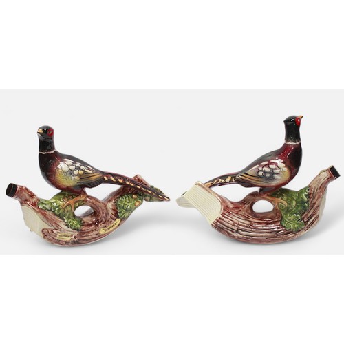 709 - Two ceramic liqueur decanters made and bottled by Garnier, both modelled as pheasants perched on a b... 