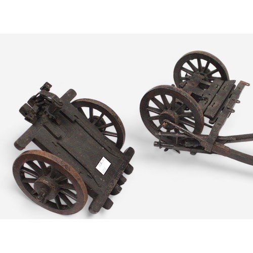 161 - Four various scale model Royal artillery gun carriages, constructed from wood with metal wheels rims... 