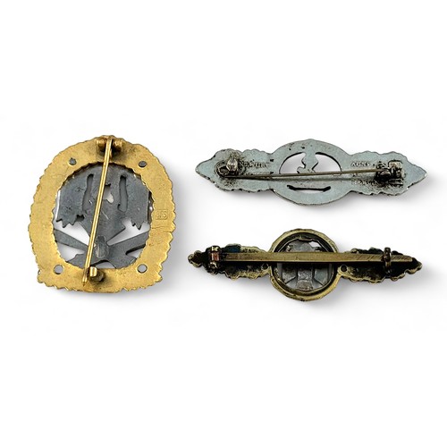 236 - A German Third Reich Luftwaffe Bomber Clasp (gilt and white metal), together with a Kriegsmarine U-B... 