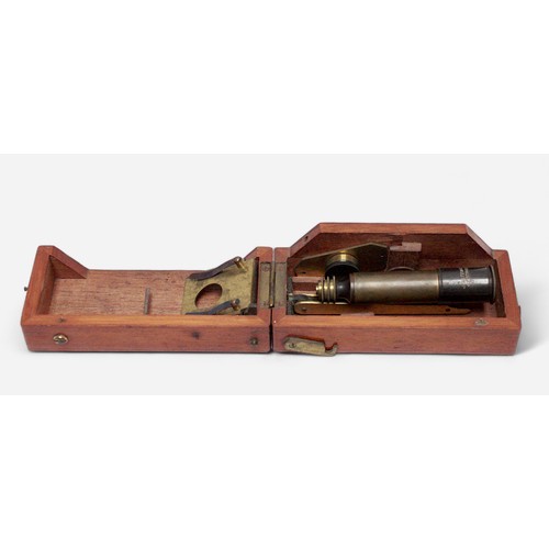 209 - A small monocular travelling microscope by J. H. Steward, Strand, London, with spare lens, housed in... 