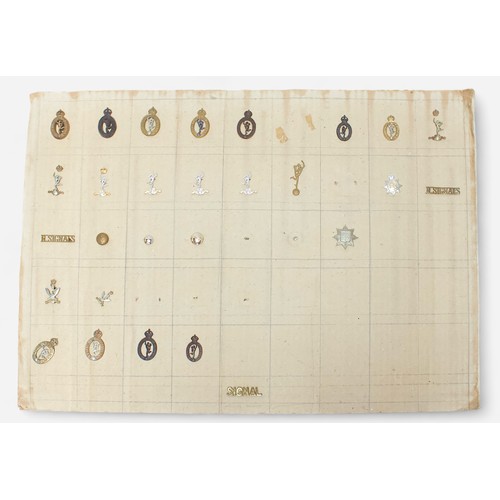 190 - Fifteen card sheets displaying a good collection of assorted cap badges and patches including exampl... 