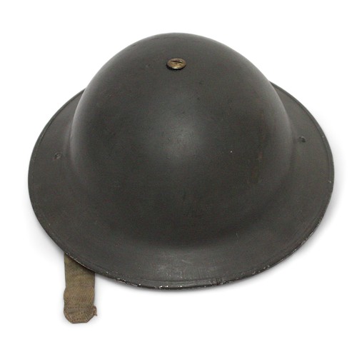 286 - A black painted British WWII fire brigade steel helmet, with decal to front, numbered 431194 to insi... 