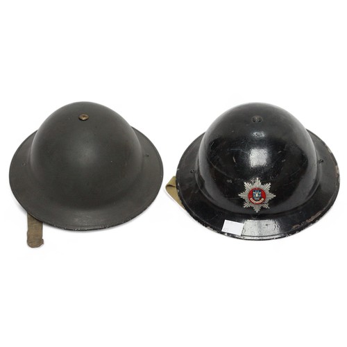 286 - A black painted British WWII fire brigade steel helmet, with decal to front, numbered 431194 to insi... 