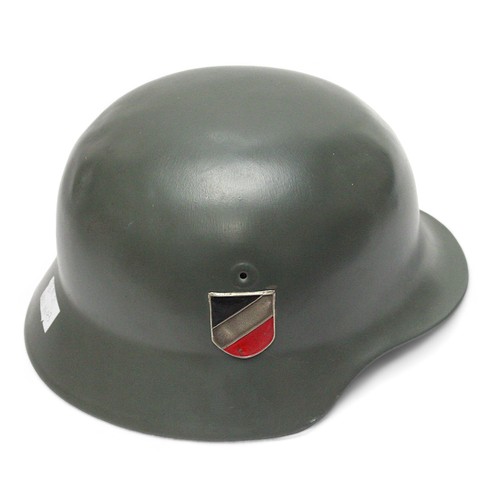 275 - A WWII German Third Reich M40 helmet, with nine-tongue leather liner, repainted green and later appl... 