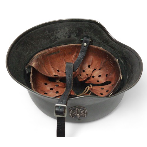 275 - A WWII German Third Reich M40 helmet, with nine-tongue leather liner, repainted green and later appl... 