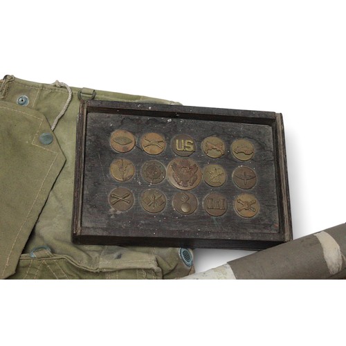 242 - A collection of assorted military collectables including a First World War German Iron Cross medal, ... 