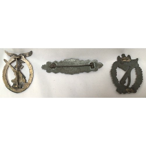 424 - Three German WWII military badges, comprising Luftwaffe Anti-Aircraft Flak Battle Badge, Close Comba... 