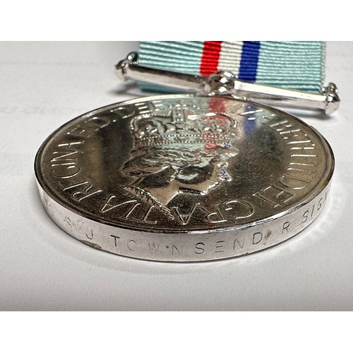 354 - The Rhodesia Medal 1980 to '24442182 Sig S.J. Townsend. R. Signals,' together with The Zimbabwe Inde... 