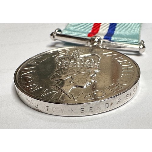 354 - The Rhodesia Medal 1980 to '24442182 Sig S.J. Townsend. R. Signals,' together with The Zimbabwe Inde... 