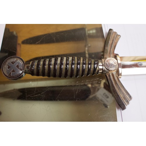 471 - A First Pattern Luftwaffe Ceremonial Dagger, with scabbard and hanger chain, blade flat engraved Amt... 