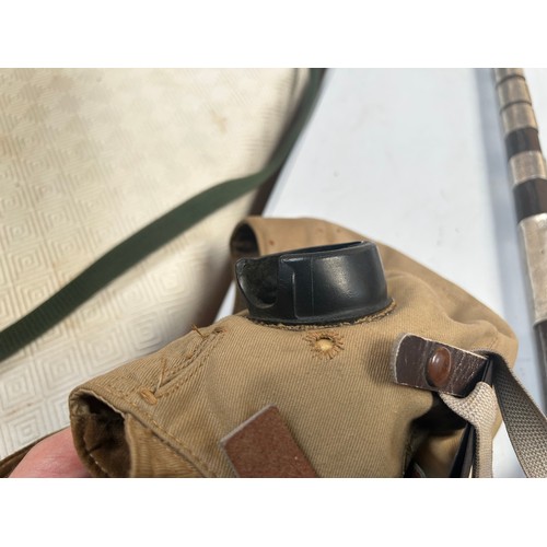 76 - An RAF D-Type Pilot’s Flight helmet with goggles, khaki canvas with neck flap, fitted with a set Gos... 