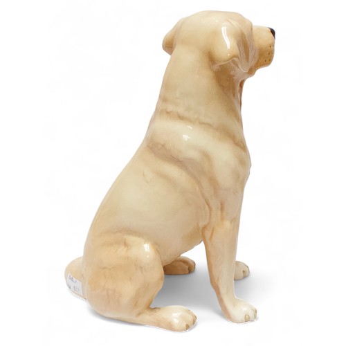 13 - A large Beswick seated fireside Golden Labrador, model no. 2314, printed and impressed marks to base... 