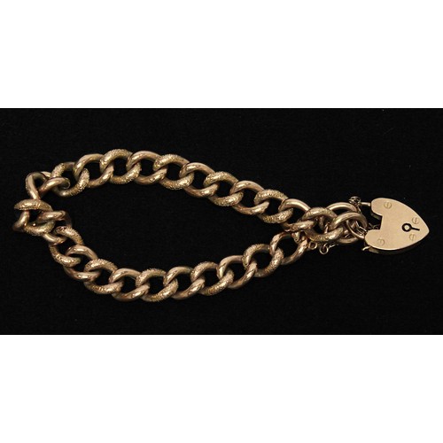 239 - A 9ct rose gold curb-link bracelet, with alternating plain and textured links and heart shaped locke... 