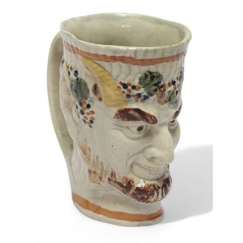 170B - A 19th Century Prattware Staffordshire ‘Bacchus’ frog mug, relief moulded bearded and horned smiling... 